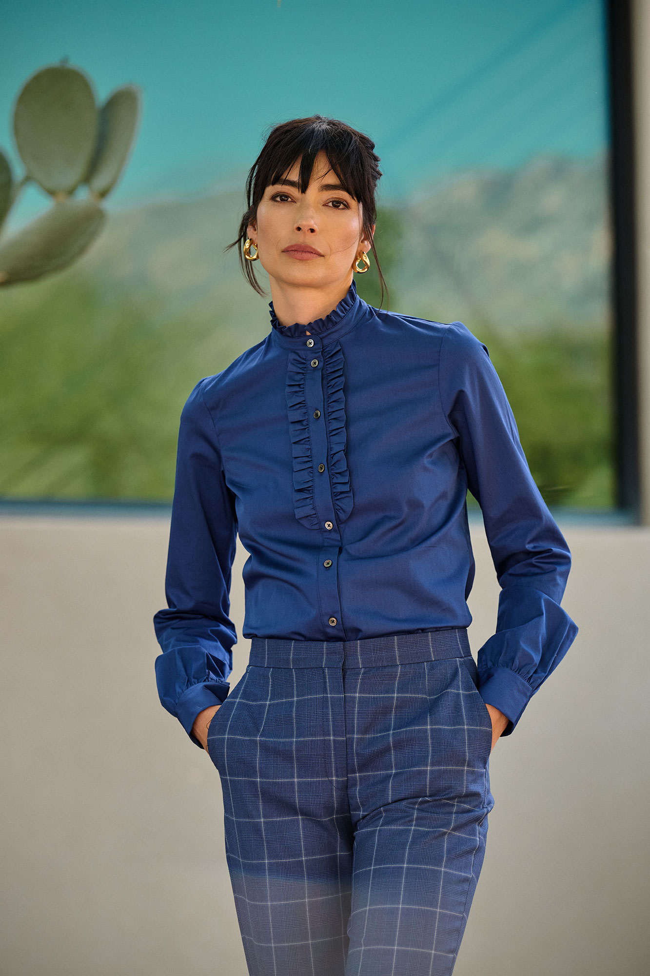 Women's blue statement ruffle shirt from Tom James FW26 collection